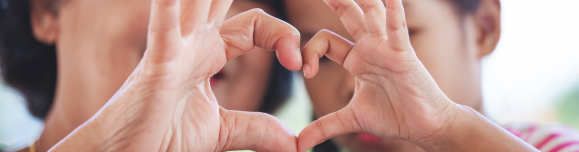 Two hands making a heart