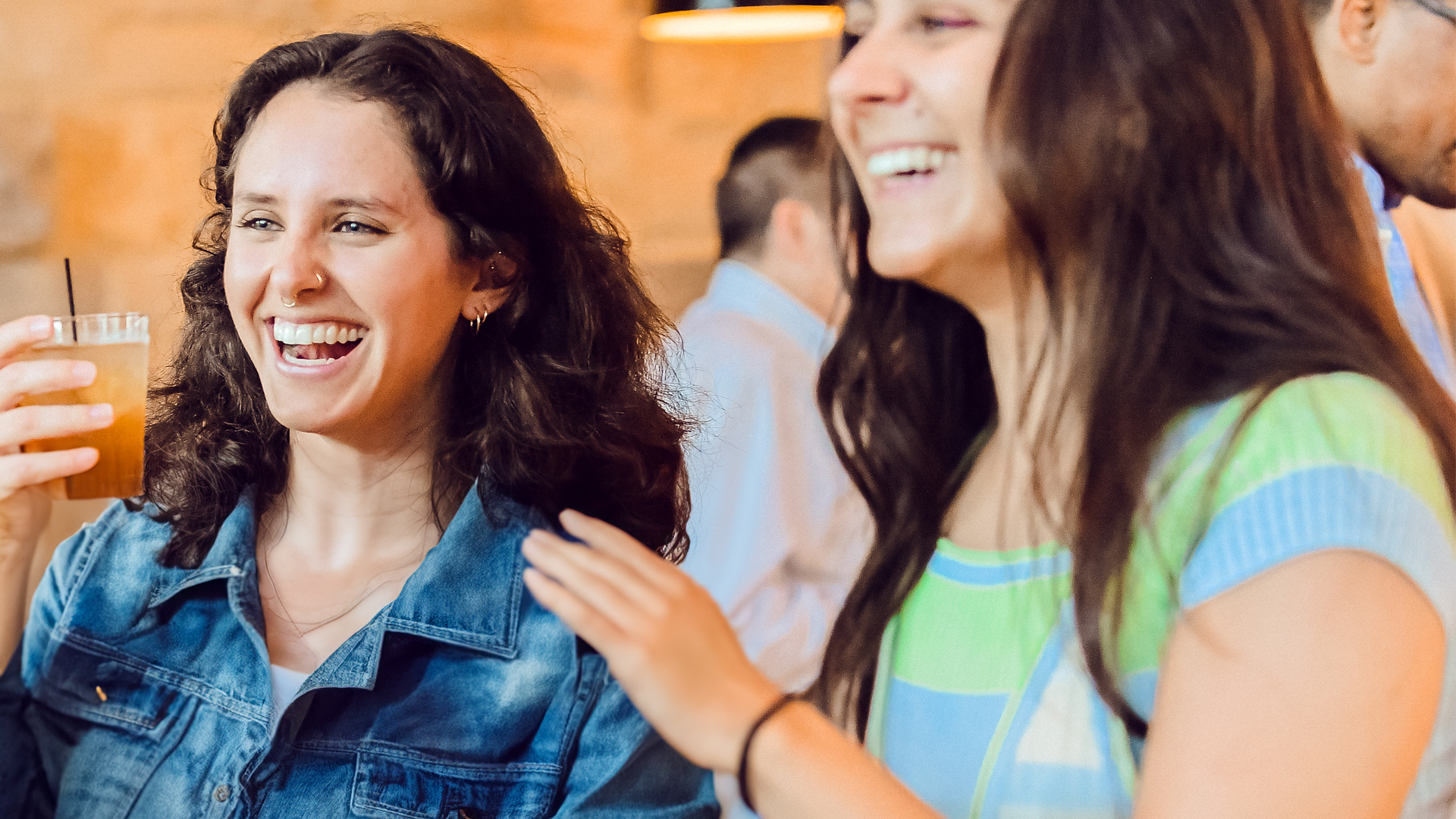 two women at a happy hour event